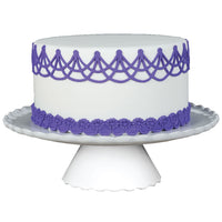 Decorated Cake Image showing the Overlapping Drop String Silicone Onlay for Fondant Cake Decorating by Marvelous Molds