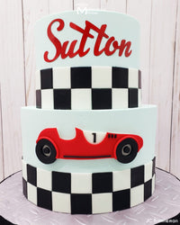 Race Car Birthday Cake decorated with checker or race car flag patterns, Marvelous Molds using the Checkerboard Silicone Onlay