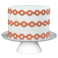 Decorated Cake Image showing the Roundabout Food Safe Silicone Onlay for Fondant Cake Decorating by Marvelous Molds