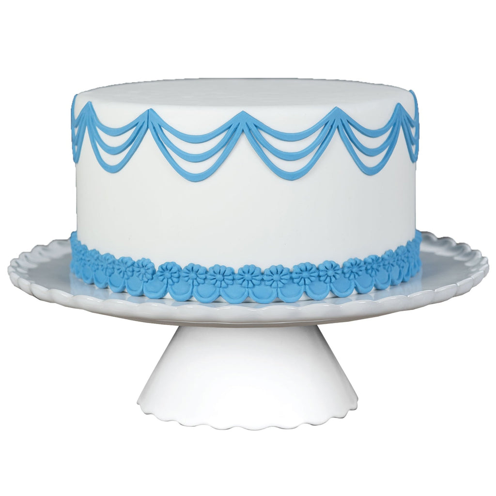 http://marvelousmolds.com/cdn/shop/products/triple_drop_string_cake.jpg?v=1661200478&width=1024