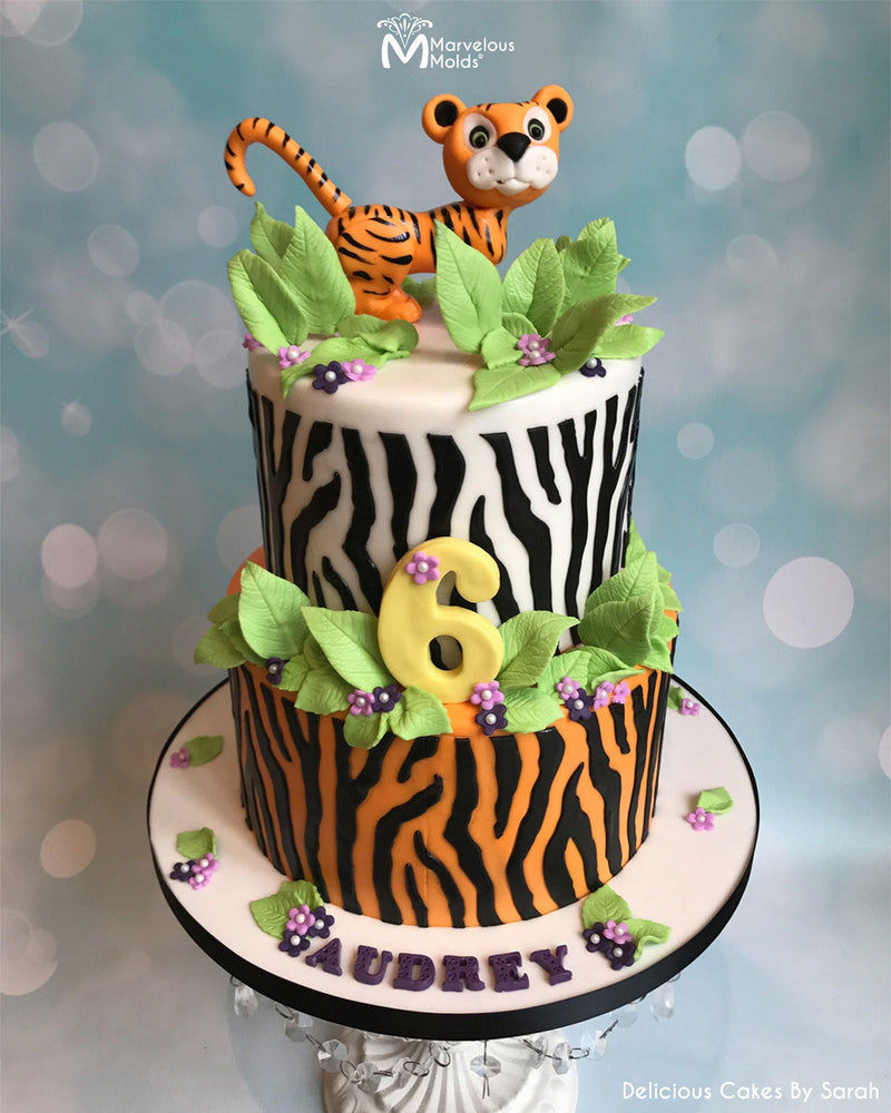 Animal Print Birthday Cake Decorated Using the Zebra Silicone Onlay Mold by Marvelous Molds