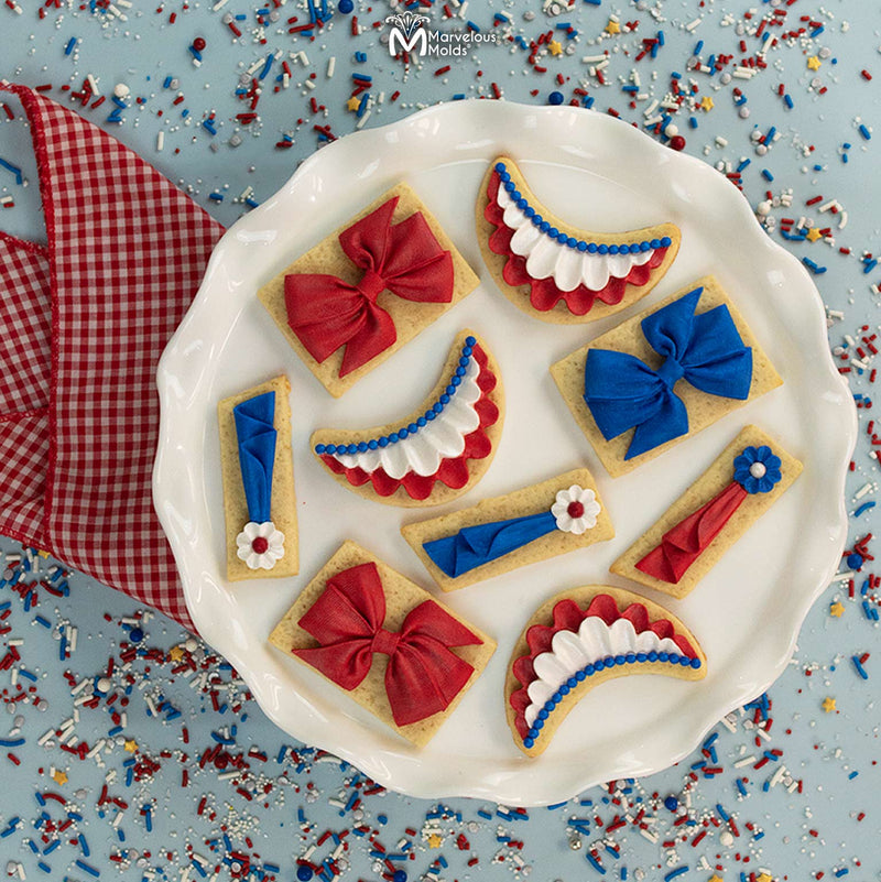 Fourth of July USA Cookie Tray, Decorated Using the Marvelous Molds Pinwheel Bow Silicone Mold for Dessert Decorating