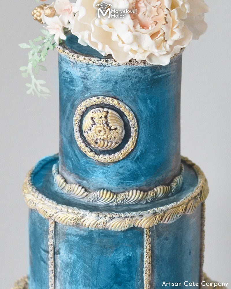 Blue Painted Wedding Cake Decorated with the Fanfare Border Silicone Mold by Marvelous Molds