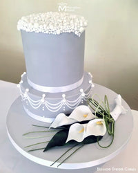 Grey Wedding Cake Decorated with the Triple Drop String Silicone Onlay Cake Stencil Mold by Marvelous Molds