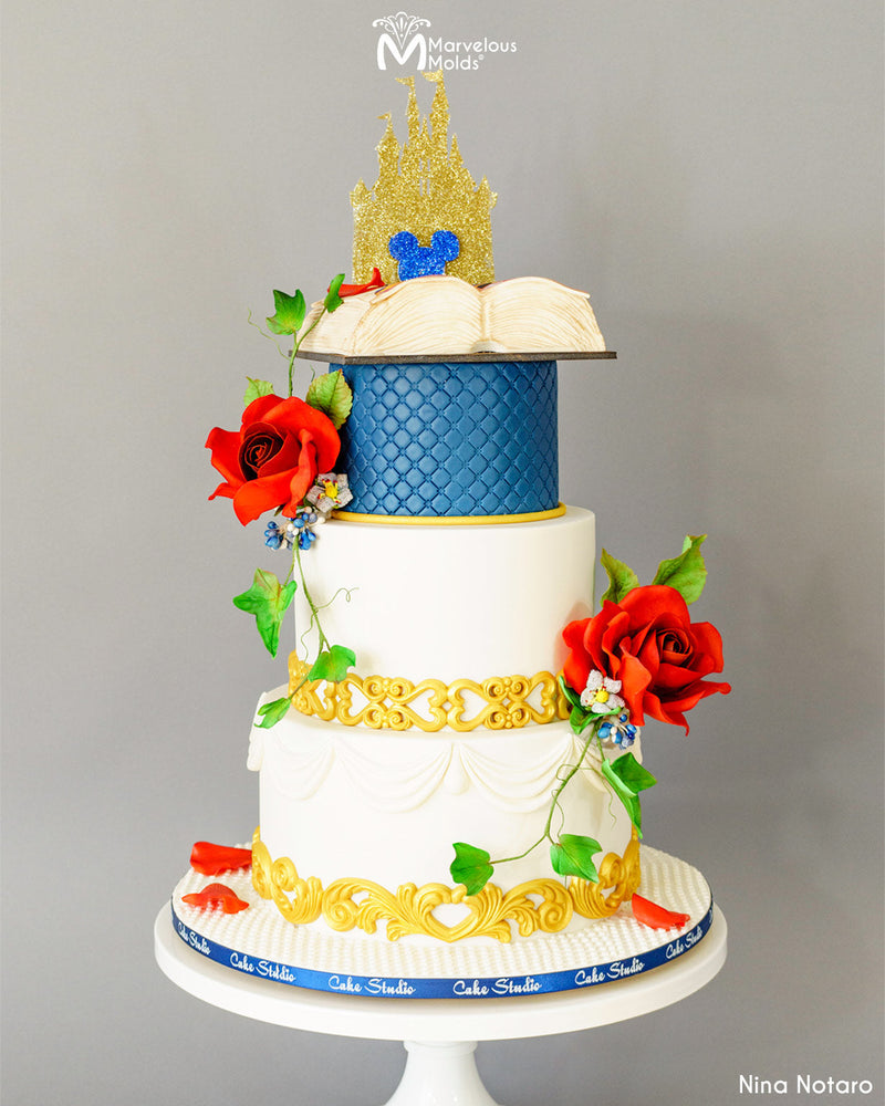 Disney Fairytale Cake Decorated with the Bellissimo Scroll Border Mold by Marvelous Molds