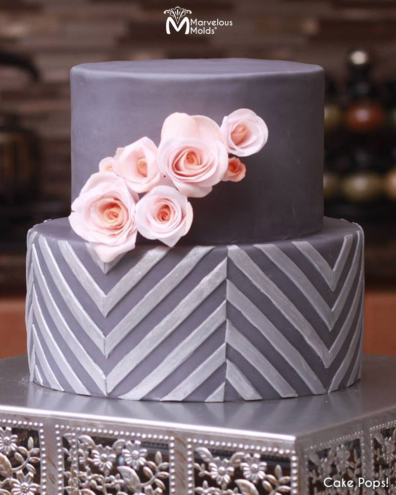Grey Chevron Cake decorated using the Clever Chevron Silicone Onlay by Marvelous Molds