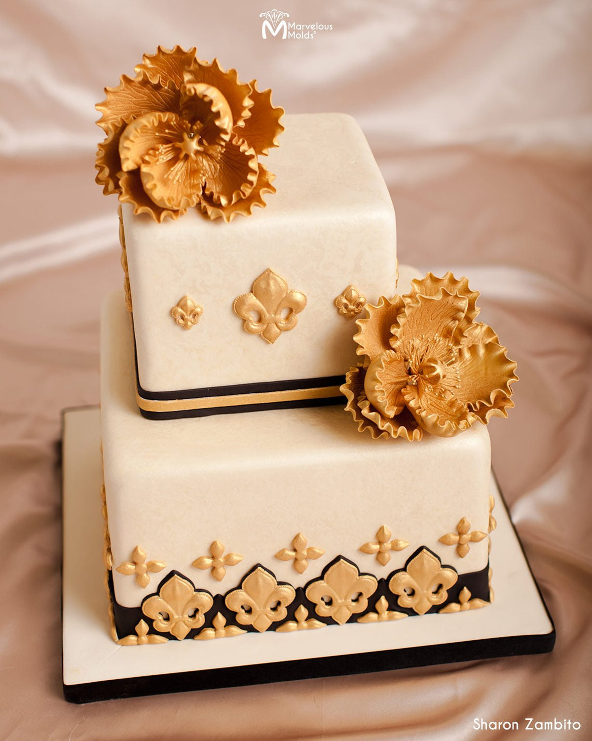Wedding cake with Fleur De Lis decorations, decorated with 3 Fleur De Lis Mold by Marvelous Molds