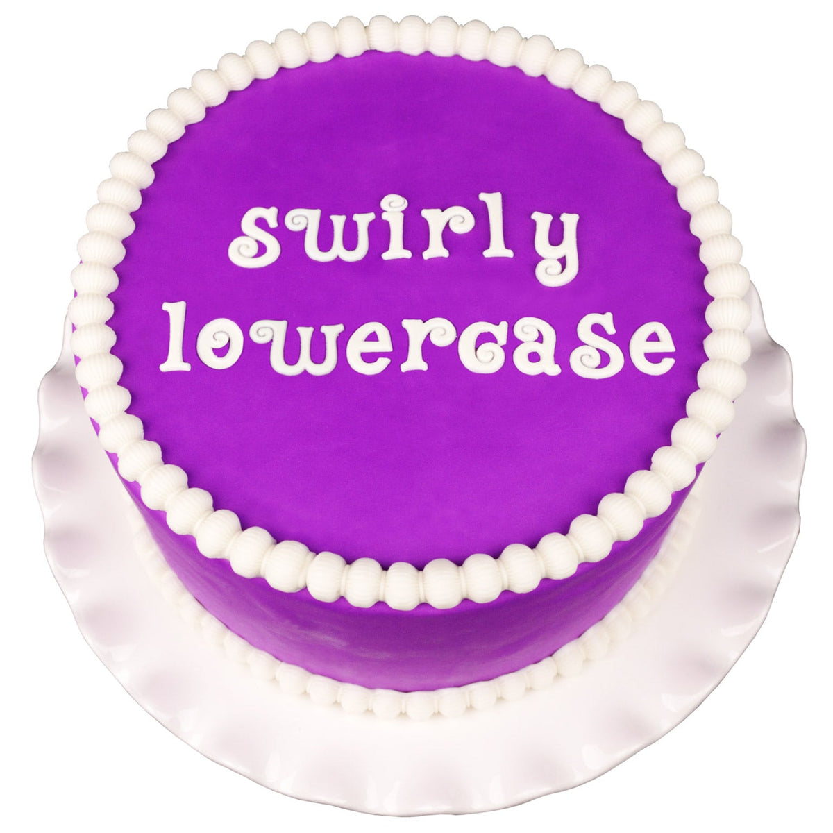 Decorated Cake using Swirly Lowercase Flexabet Food Safe Silicone Letter Maker by Marvelous Molds