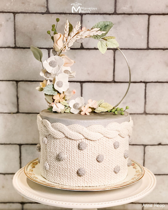 White Knit Textured Wedding Cake Decorated with the Marvelous Molds Medium Knit Buttons Silicone Mold