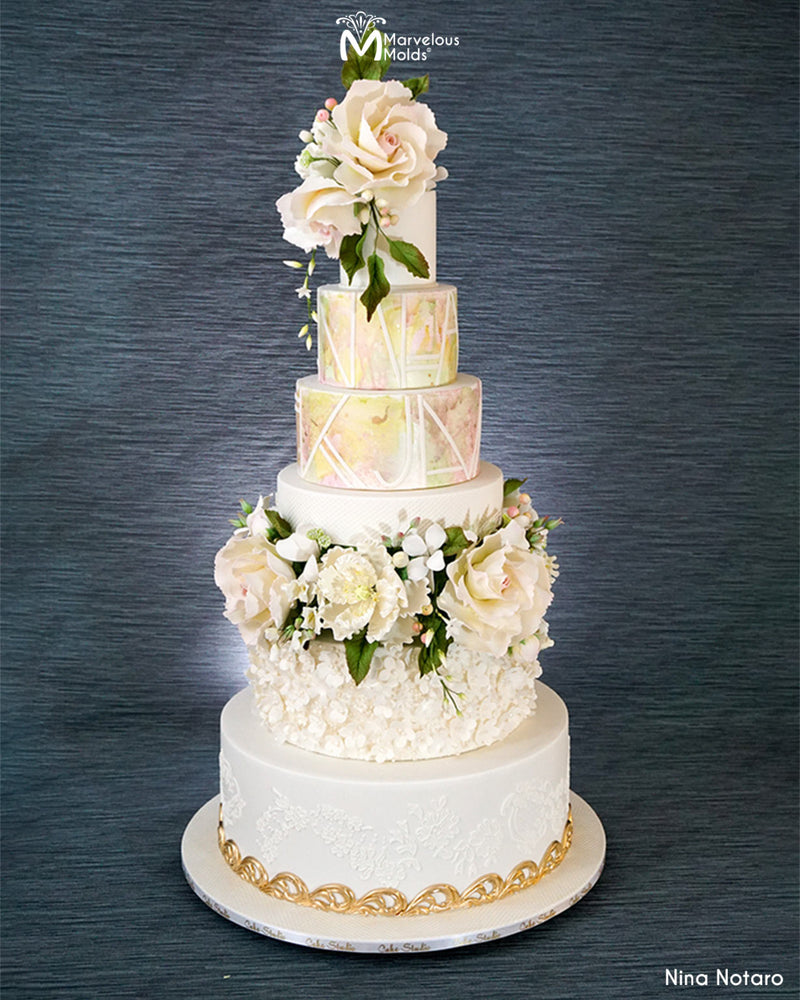 White Garden Wedding Cake Decorated Using the Marvelous Molds Flourish Border Silicone Mold