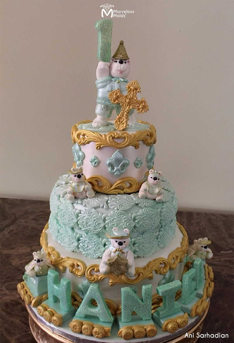 Birthday Cake with Scroll Borders and Fleur De Lis, decorated with 3 Fleur De Lis Mold by Marvelous Molds