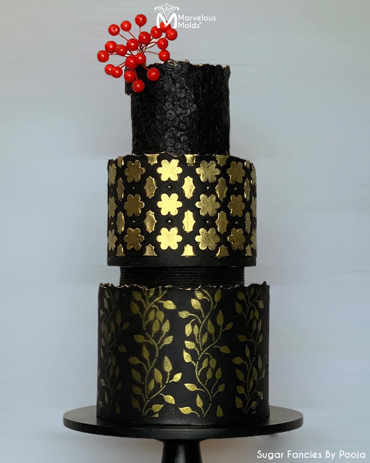 Gold detailed Black Cake Decorated using Marvelous Molds Silicone Stencil Daisy Chain Silicone Onlay