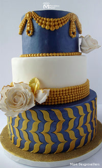 Gold detailed wedding cake decorated with Classic Pearl Drop Silicone Mold by Marvelous Molds