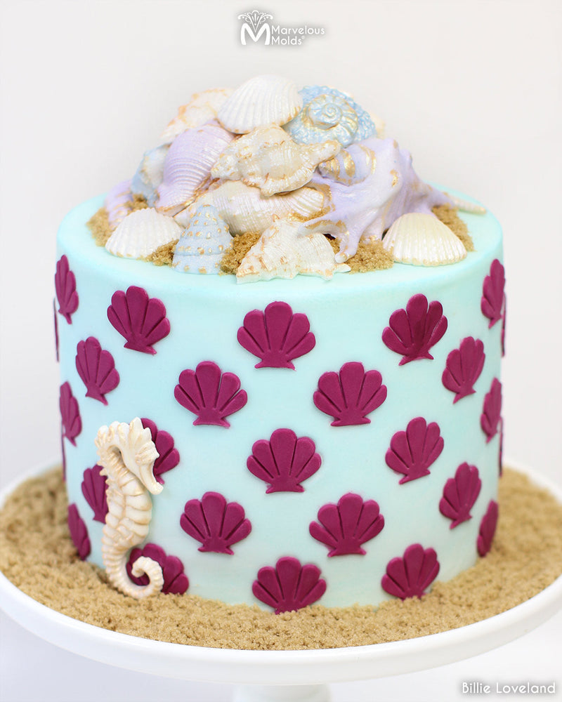 Pink Shell Pattern Beach Themed Wedding Cake Topped with Shells Created Using the Marvelous Molds Lambis Shell Silicone Mold