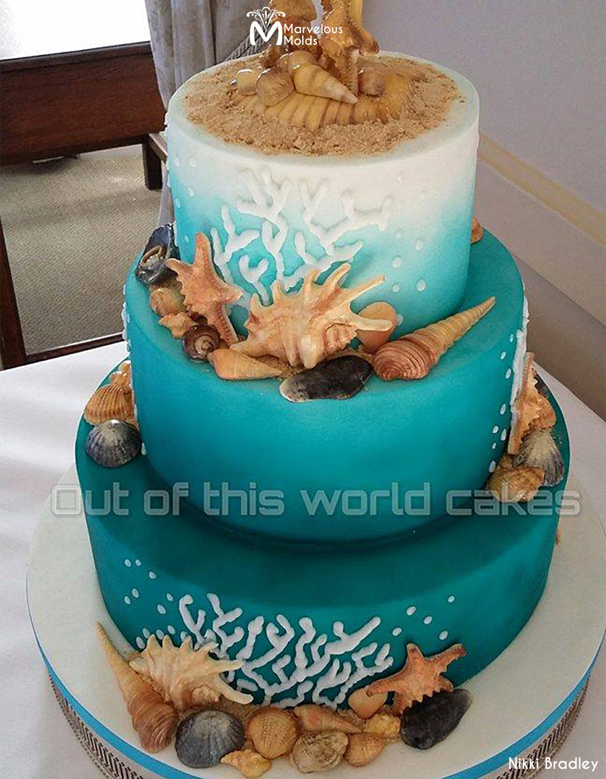 Sea Foam Blue Wedding Cake Decorated with the Marvelous Molds Lambis Shell Silicone Mold