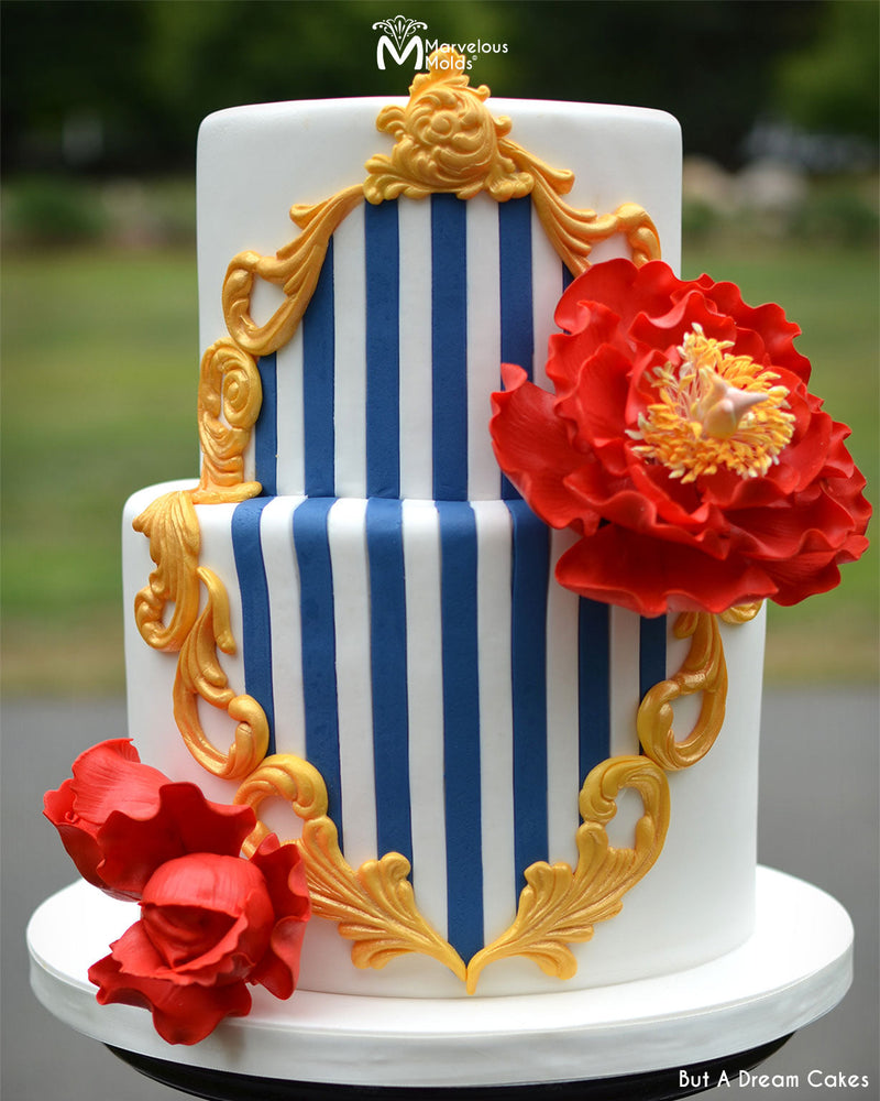 Navy Blue and White Stripe Cake with Gold Embellishments Created Using the Marvelous Molds Scroll Ensemble Left Silicone Mold