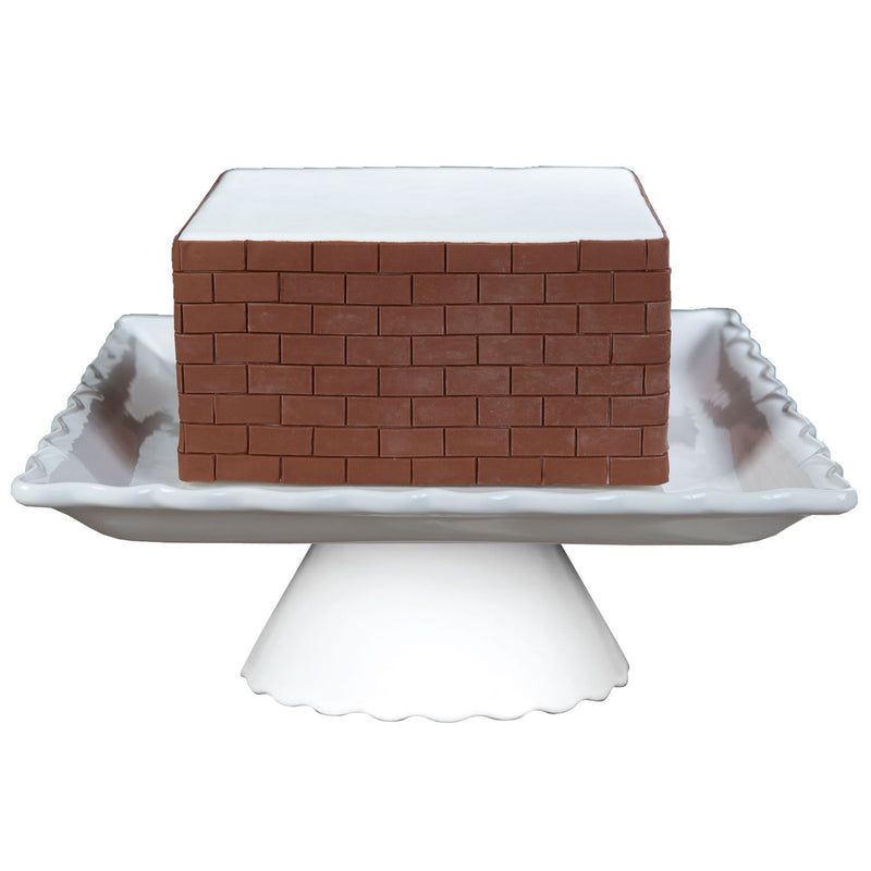 Decorated Cake image showing the Bricks Silicone Onlay for Fondant Cake Decorating by Marvelous Molds