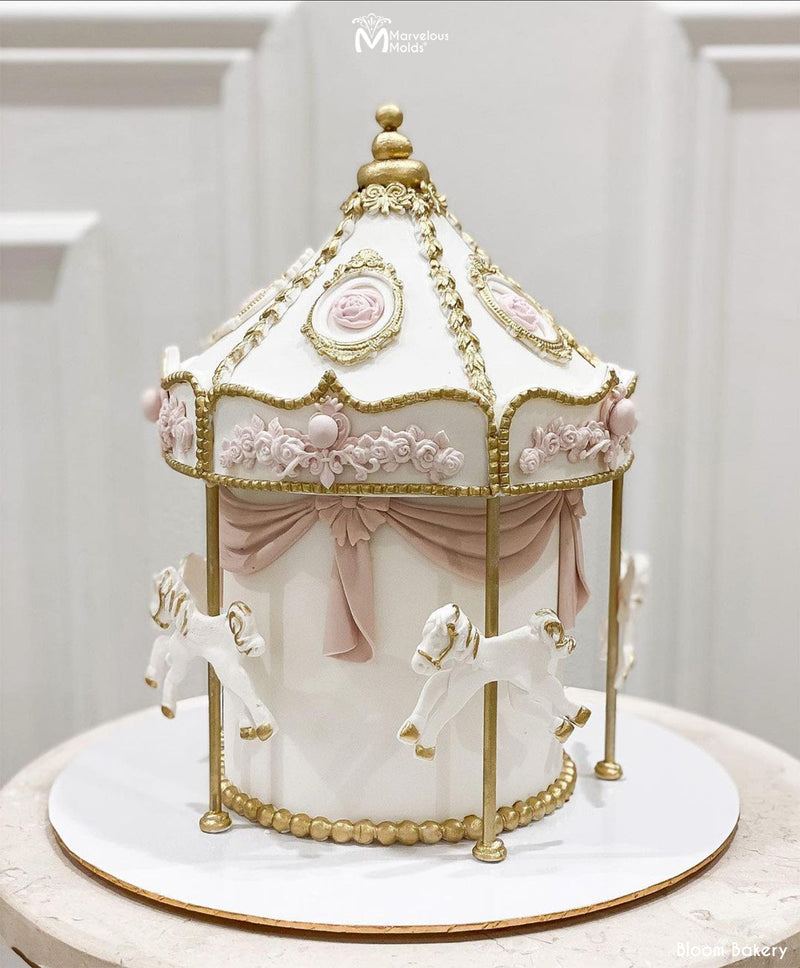 Carousel Decorated Cake with Swag Detail Created Using the Marvelous Molds Large Classic Swag
