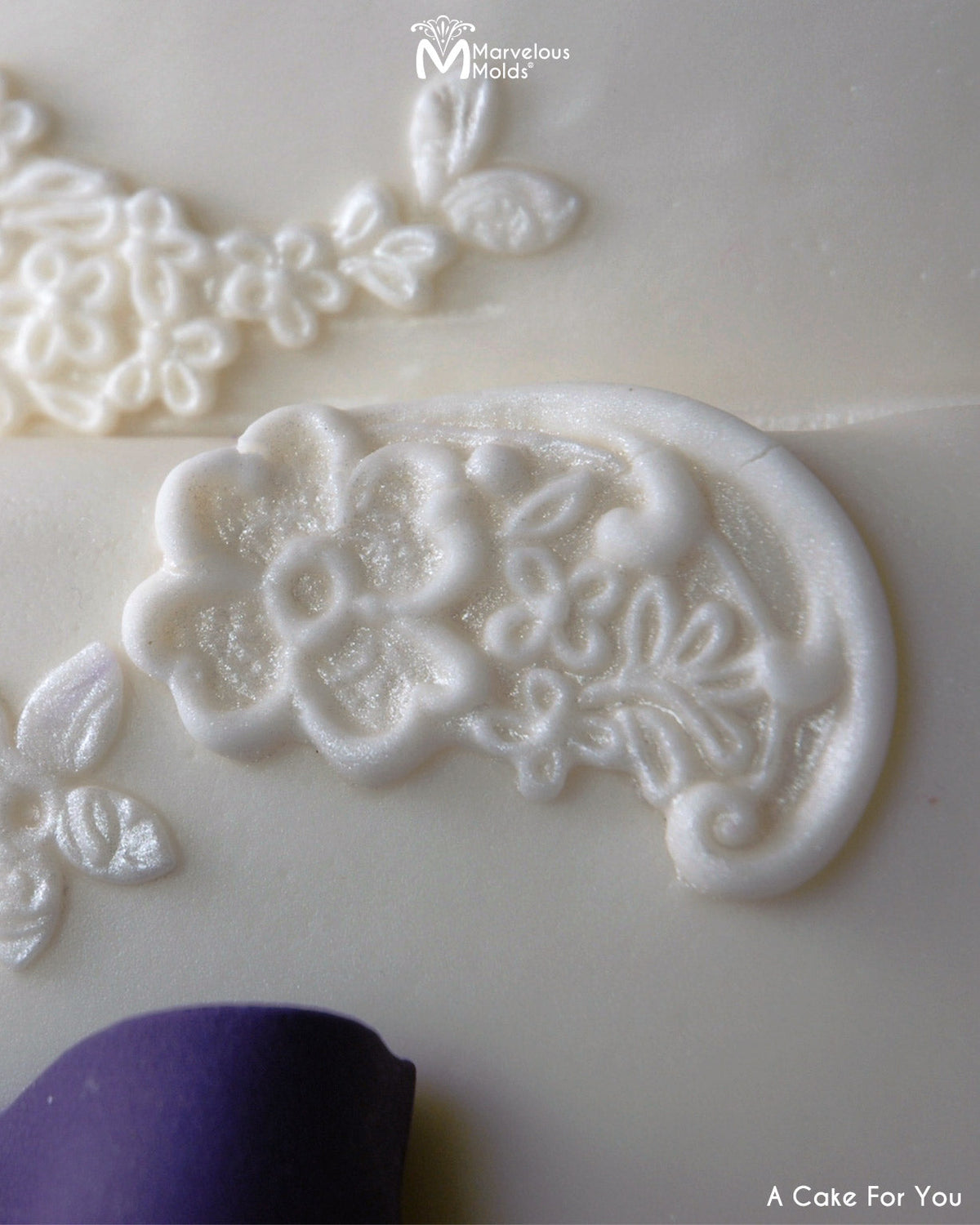 Fondant Lace Decoration on a Cake Created Using the Marvelous Molds Ann Lace Left Silicone Mold