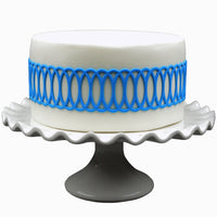 Decorated cake image showing the Elation Food Safe Silicone Onlay for Fondant Cake Decorating by Marvelous Molds