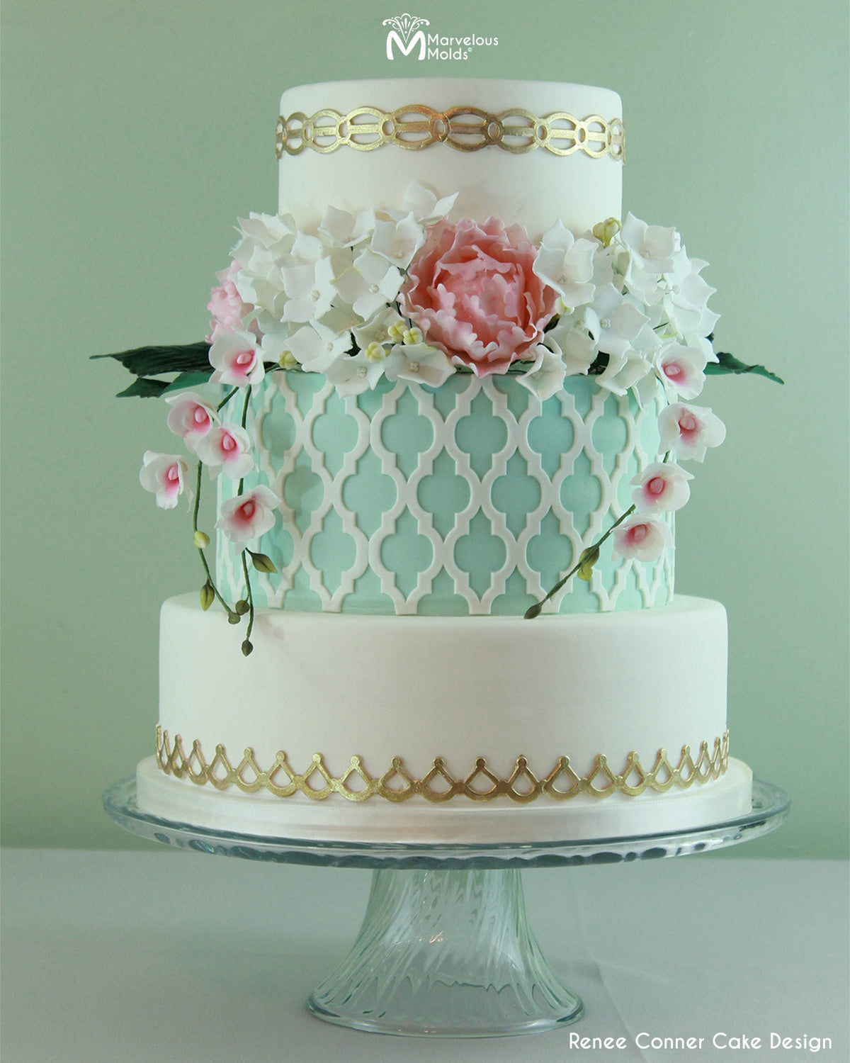Mint and White Cake with Gold Borders Created Using the Marvelous Molds Regalia Silicone Onlay Cake Stencil