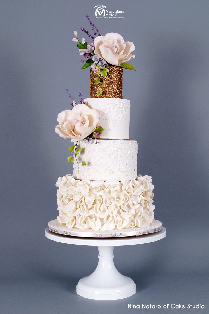 White Wedding Cake with Ruffles decorated using the Marvelous Molds Confetti Already Simpress