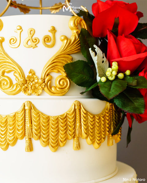 White Wedding Decorated with Gold Tassels and Swags Created with Marvelous Molds Grand Drape Swag by Marvelous Molds