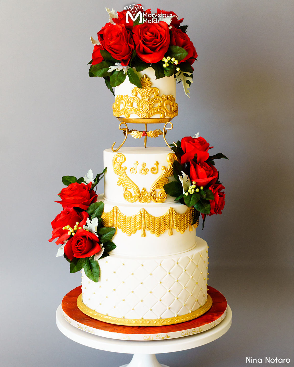 https://marvelousmolds.com/cdn/shop/products/gold-white-wedding-cake-grand-drap-swag-grand-tassel-drop-edna-lace-tiara-marvelous-molds.jpg?v=1676397396&width=1200
