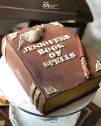 Harry Potter Book of Spells Cake with realistic leather texture, created using the Marvelous Molds Distressed Leather Impression Mat