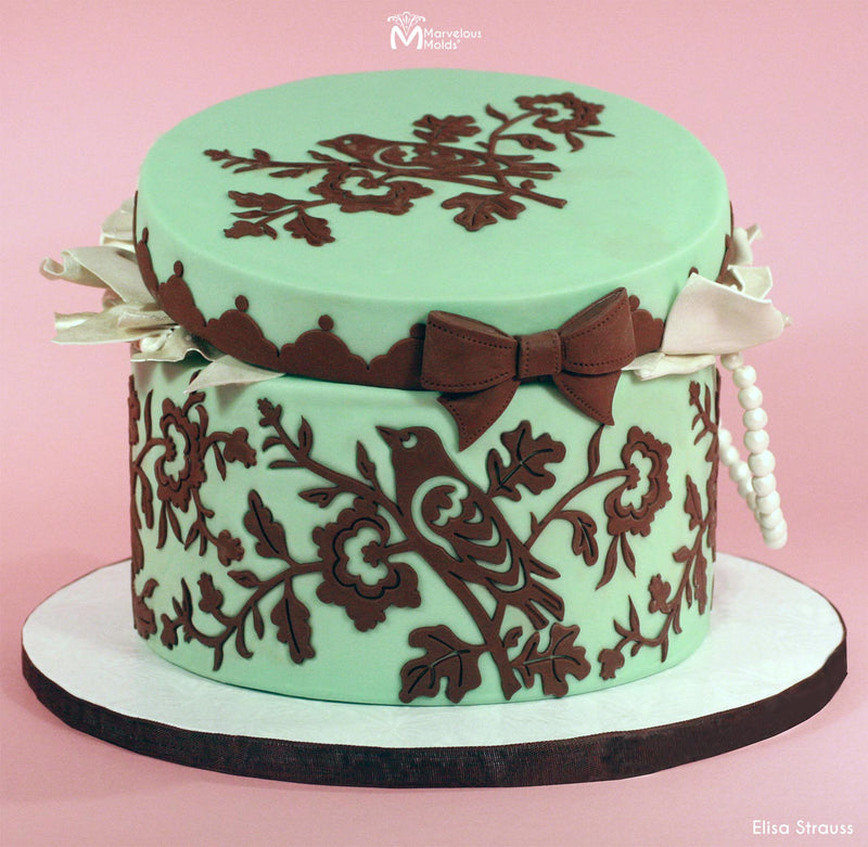 Hat Box Cake Decorated Using the Marvelous Molds Vintage Bow Silicone Mold for Cake Decorating