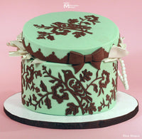 Mint Colored Cake Hat Box Decorated Using the Marvelous Molds Bird with Blossoms Silicone Onlay Cake Stencil