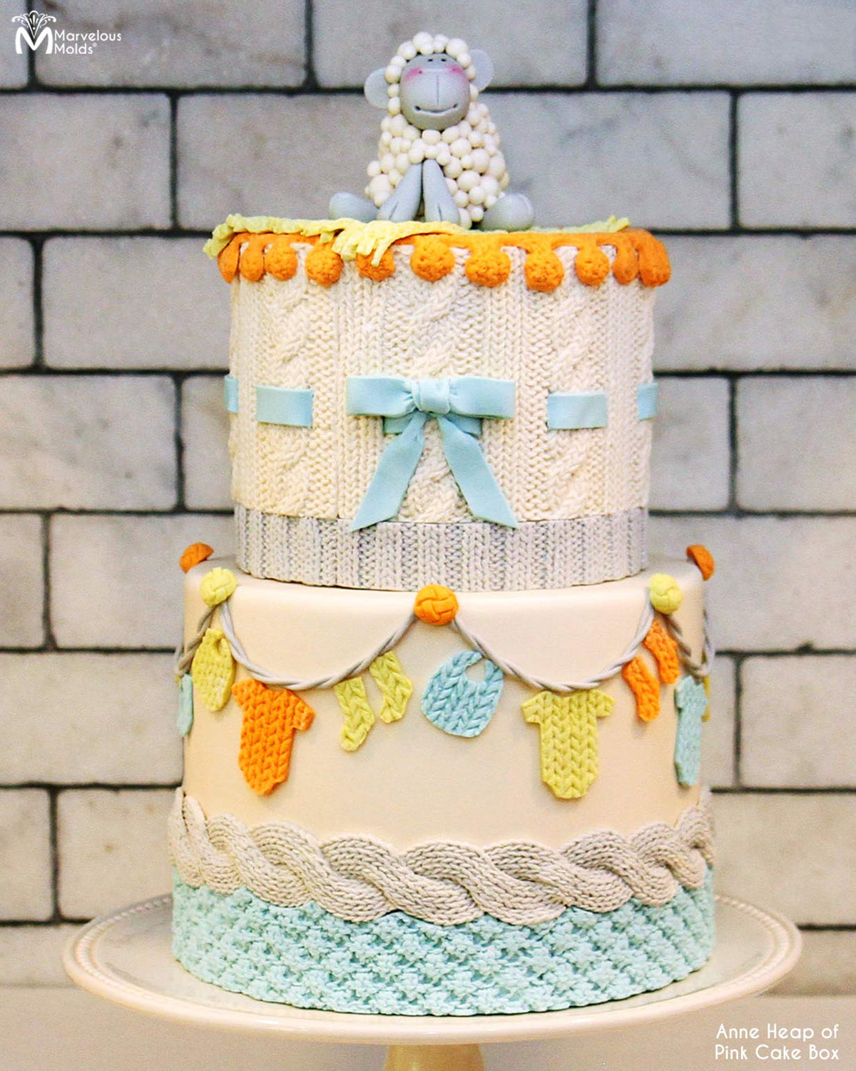 Baby Shower Cake Decorated with Knit Patterns, using Marvelous Molds Cable Knit Border Mold