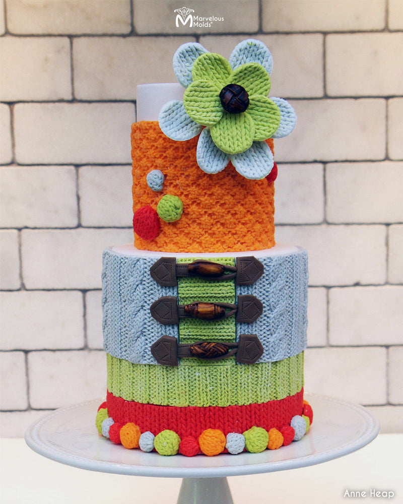 Colorful Knitted Texture Cake Created Using the Marvelous Molds Ribbed Knit Border Silicone Mold for Cake Decorating