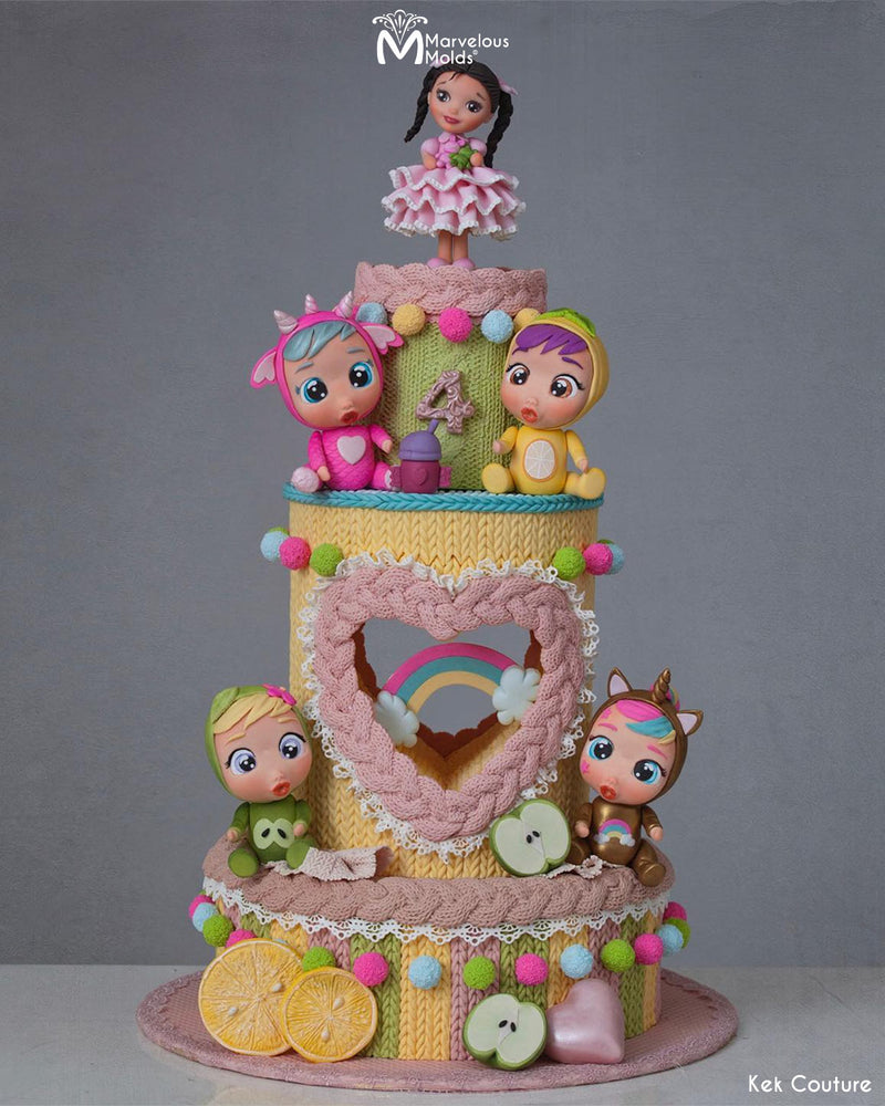 Knitted Textured Cake for a child's fourth birthday using the Braided Knit Border Mold by Marvelous Molds