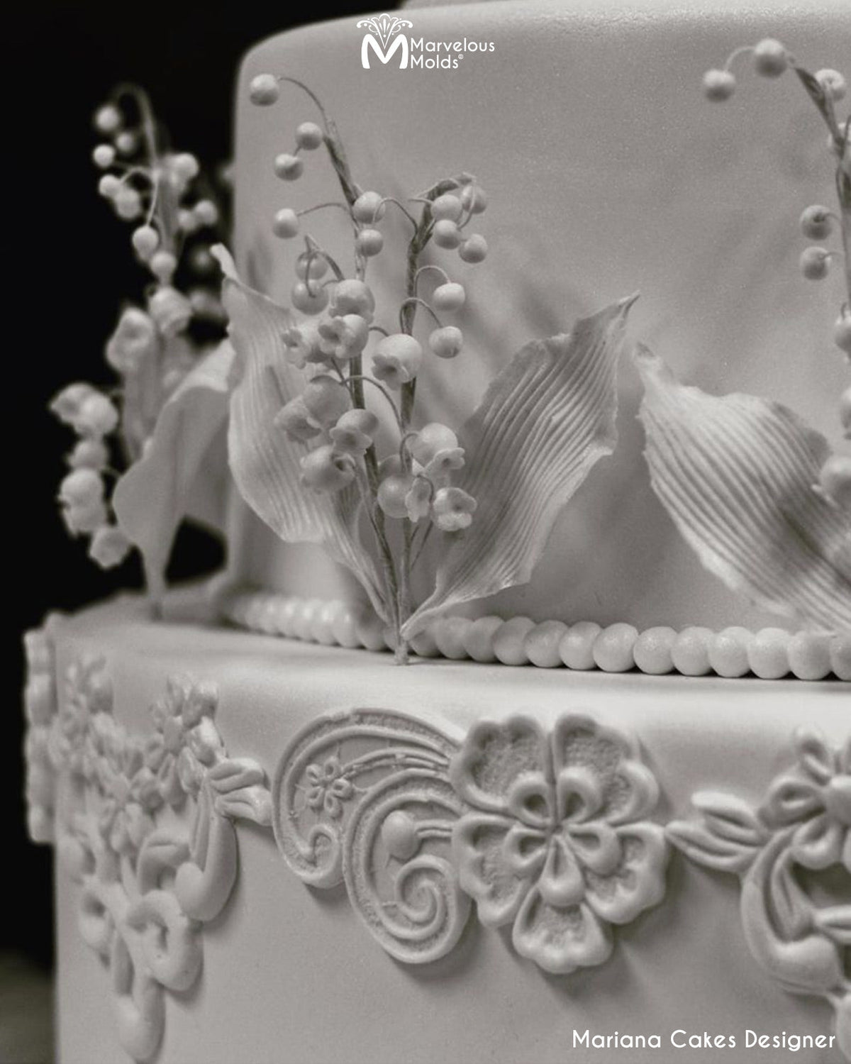 White Wedding Cake Decorated with the Joan Left Lace Mold by Marvelous Molds