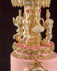 Angels and Swans Carousel Decorated Using the Marvelous Molds Flourish Centerpiece Silicone Mold
