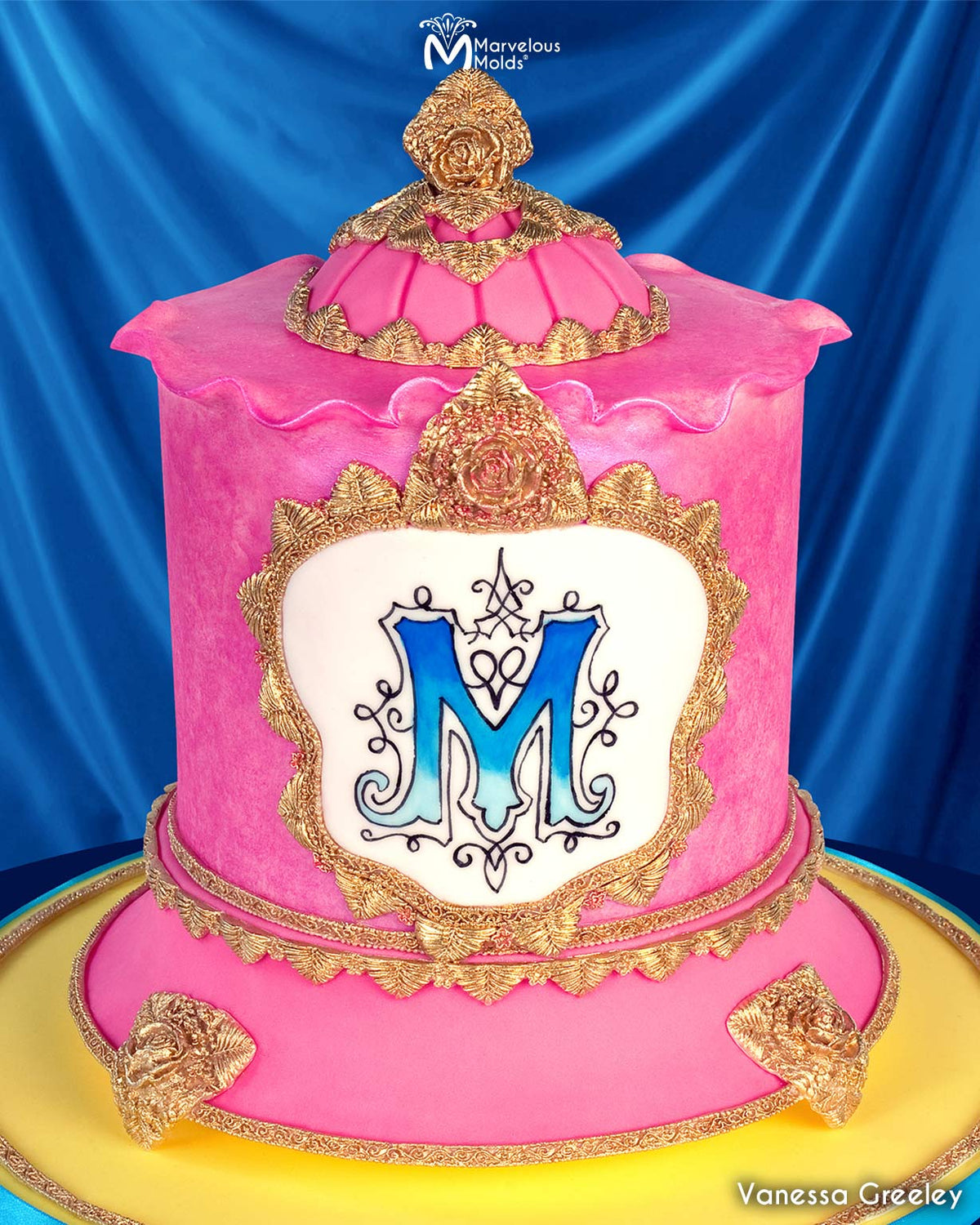 Pink Birthday Cake with Gold Embellishments Decorated Using the Crescendo Medallion Silicone Mold by Marvelous Molds