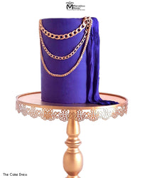Purple Fashion Cake with Edible Sugar Plissé Fabric Design and Draped Gold Chains, Decorated Using the Marvelous Molds Large Chain PinchPro Silicone Mold for Cake Decorating