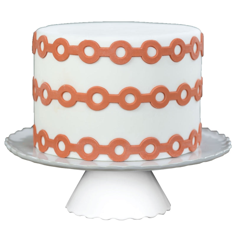 Decorated Cake Image showing the Roundabout Food Safe Silicone Onlay for Fondant Cake Decorating by Marvelous Molds