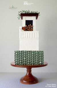 Winter Themed Hearth Cake Decorated Using the Marvelous Molds Ribbed Knit Border Silicone Mold for Cake Decorating
