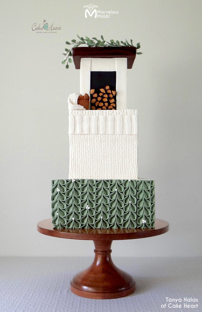 Winter Themed Hearth Cake Decorated Using the Marvelous Molds Ribbed Knit Border Silicone Mold for Cake Decorating