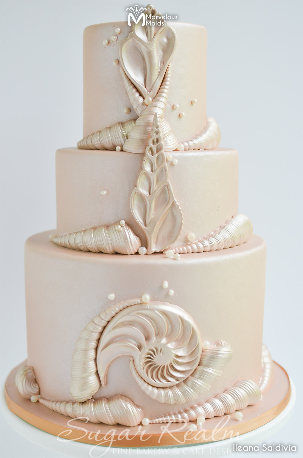 Off-White Wedding Cake Decorated Using Marvelous Molds Cross-Cut Conch Shell Mold