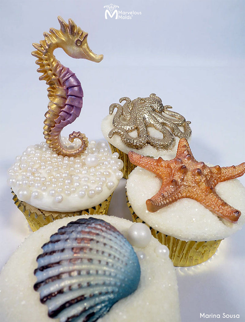 Ocean Themed Cupcakes with Sugar Seashell and Octopus Cupcake Toppers Created with the Marvelous Molds Octopus Silicone Mold