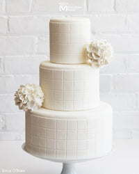 Simple White Wedding Cake with Checkered Pattern, decorated with the Checkerboard Silicone Onlay by Marvelous Molds