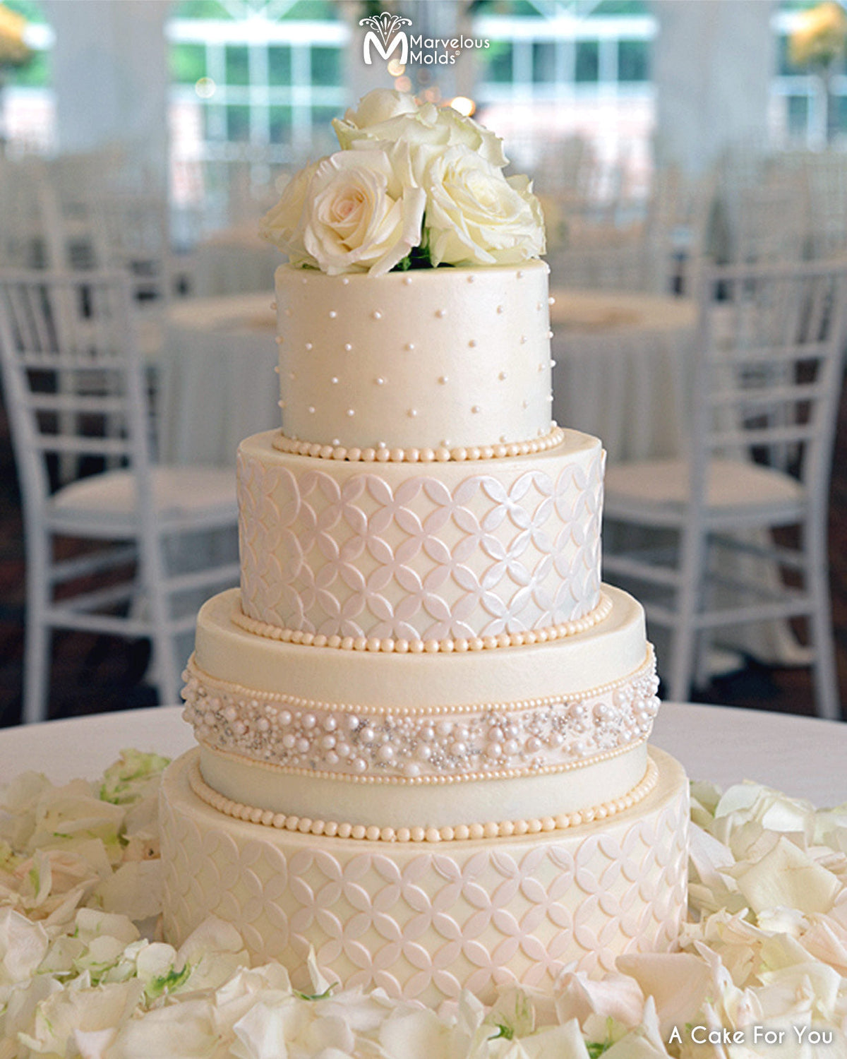 White Wedding Cake Decorated Using the Marvelous Molds Double Wedding Ring Silicone Onlay