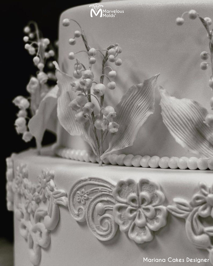 White Wedding Cake Decorated with the Joan Right Lace Mold by Marvelous Molds