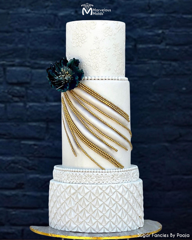 Modern White Wedding Cake with Pearls and Pleated Patterns Decorated Using the Marvelous Molds Lavish Loops Silicone Simpress Mold