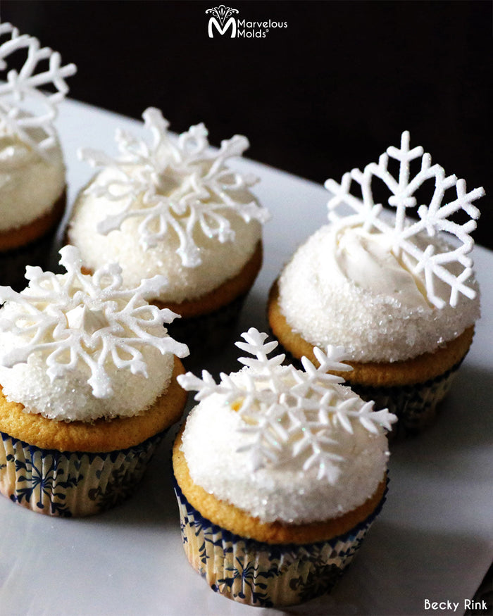 Snowflake Cupcakes Decorated Using Marvelous molds Dasher Cakeflake Snowflake Silicone Onlay Stencil